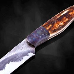 Campo de Cielo Meteorite and O1 Damascus Hunting Knife close up