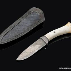 Oosic and Damascus Frontiers Blade with seal overlay sheath