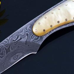 Gold Lip Pearl and Damascus Dress Knife close up